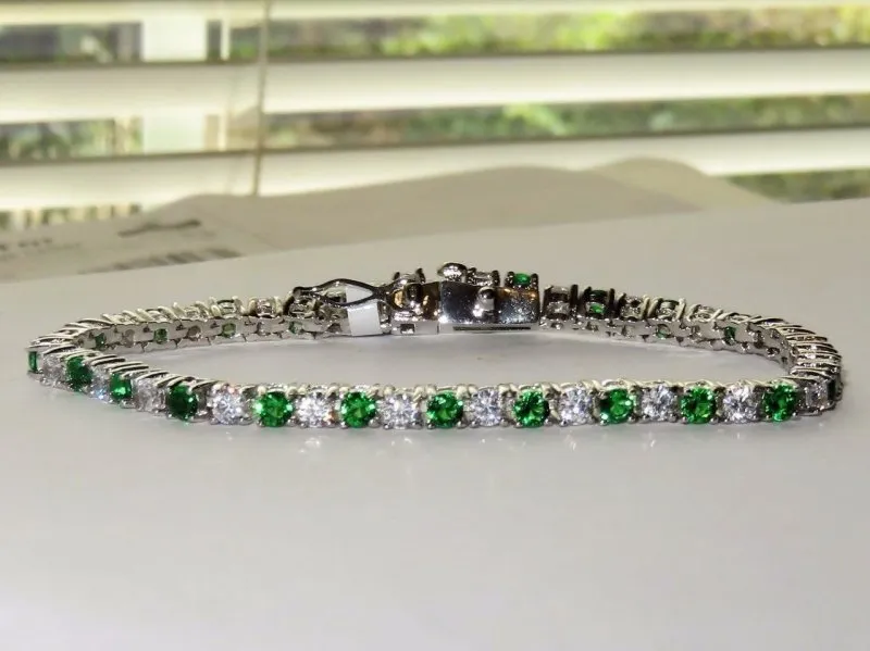 Ladies Emerald green simulate Cubic Zirconia Silver & Green tennis bracelets by Jewellery Kingdom | Electroplated with 18k white gold