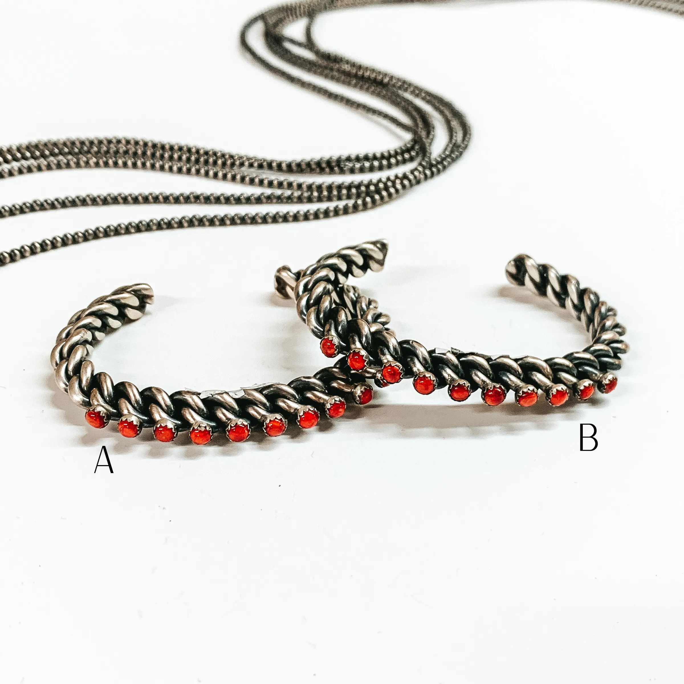 Navajo | Navajo Handmade Sterling Silver Braided Cuff with Ten Small Red Coral Stones