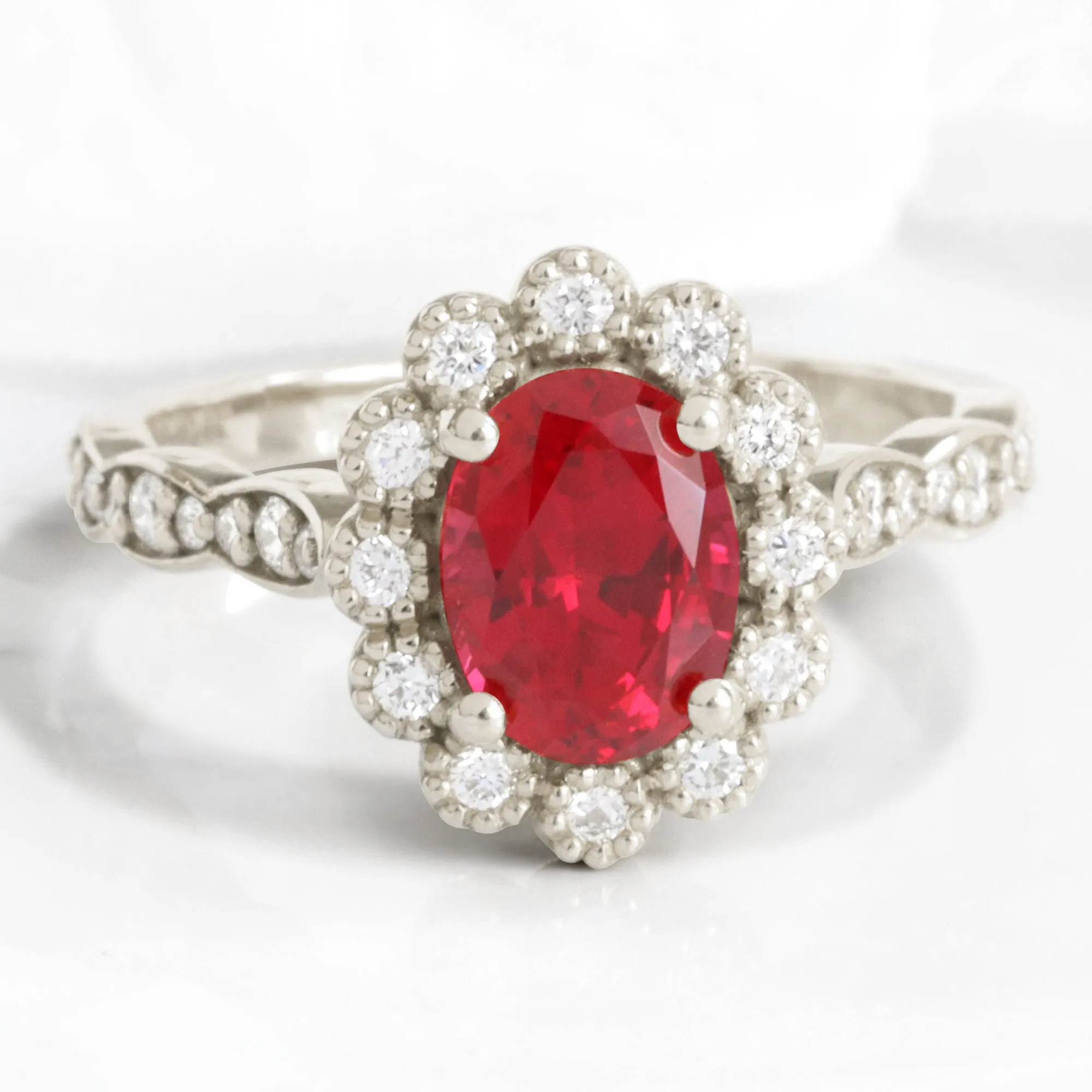 Oval Ruby Engagement Ring in Vintage Luna Halo Diamond Ring