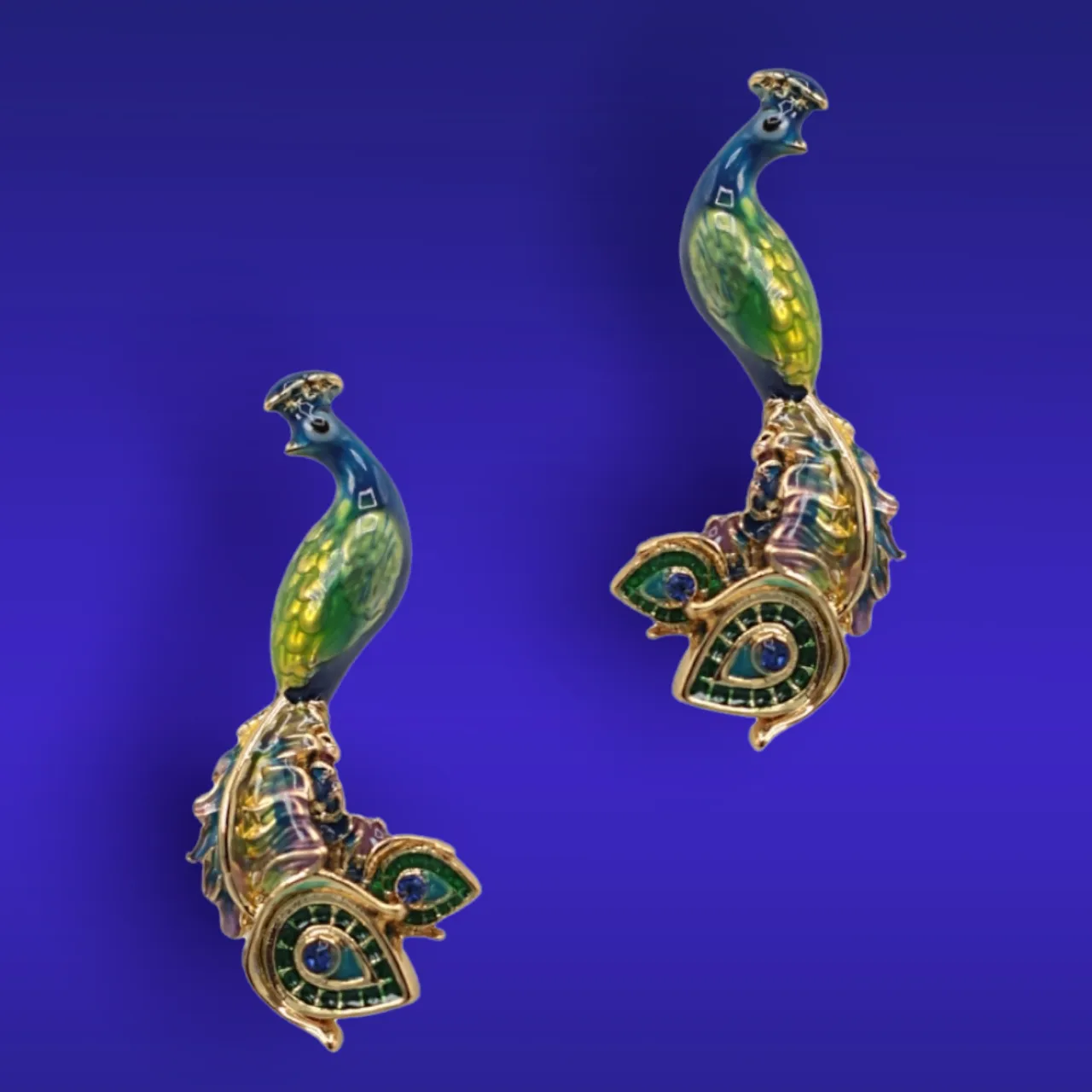 Peacock earrings by Bill Skinner