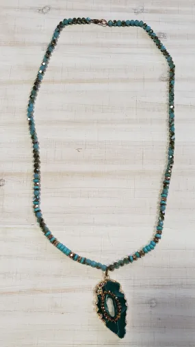 Turquoise and brown beaded necklace with turquoise and gold stone pendant